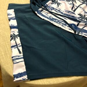 Bathing suit , never worn . It’s a 2 piece with a matching bottom.